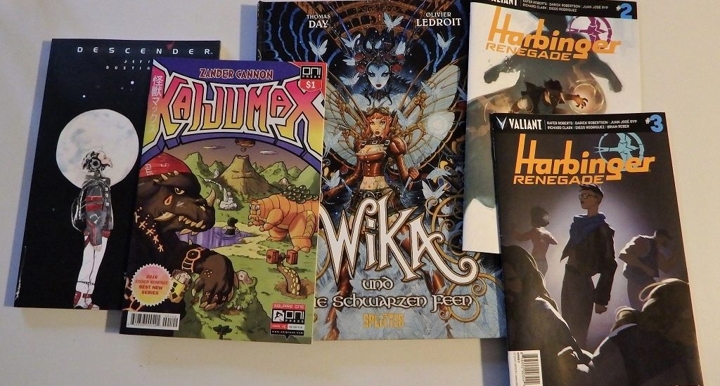 5 Comics nebeneinander ausgebreitet