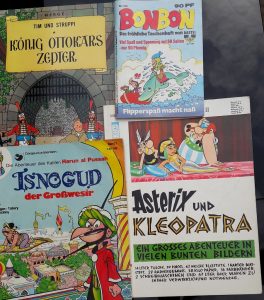 4 Comics der Serien Tim und Struppi, Bonbon Taschenhefte, Isnogud und Asterix