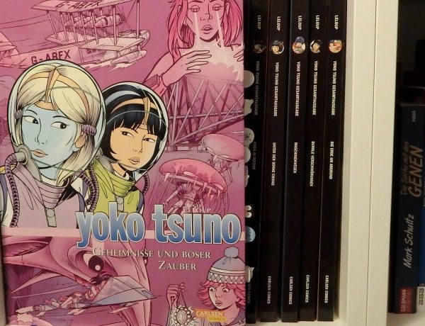 Yoko Tsuno Sammelband 9 hat einen rosa-lila Hintergrund und zeigt Yoko und Khany auf dem Cover