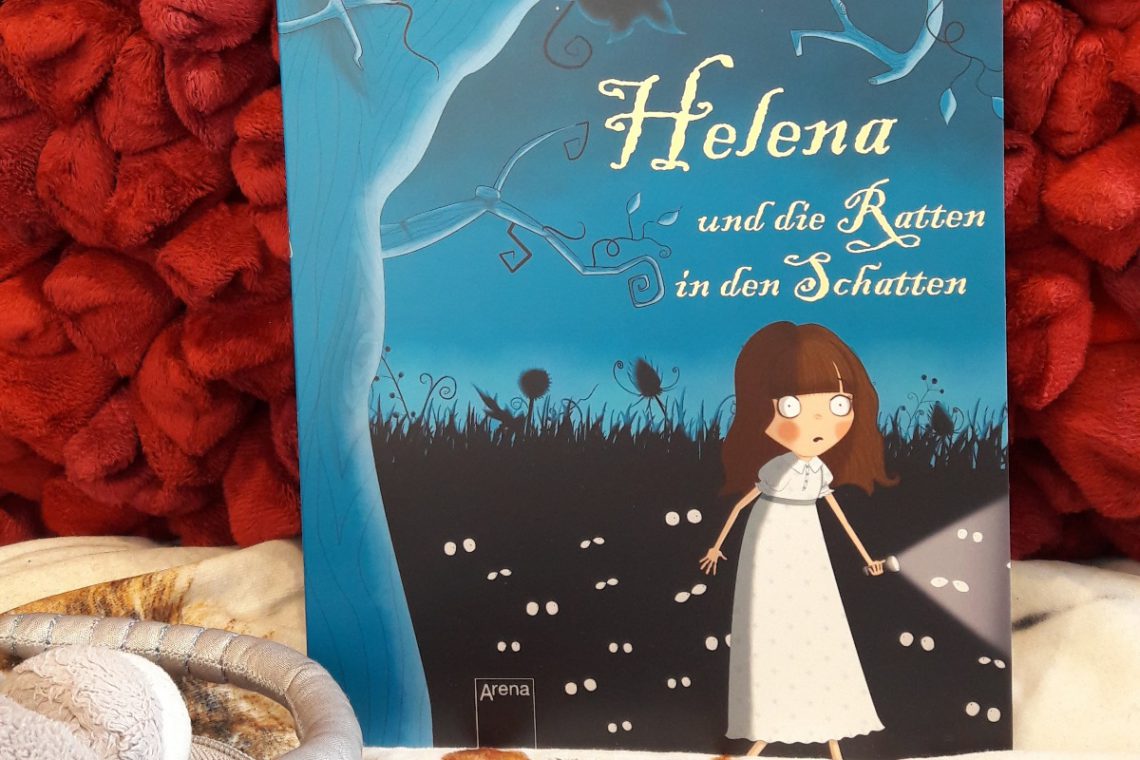 Helena und die Ratten in den Schatten Titelbild. Buch auf einem roten Kissen