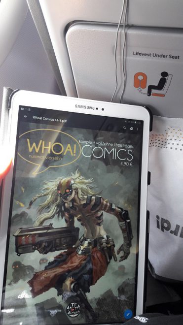 Whoa Comics 14 - Lesen im Flugzeug