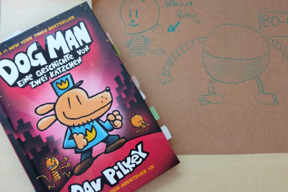 Comic zeigt den Polizisten mit Hundekopf, daneben eine Zeichnung auf braunem Papier