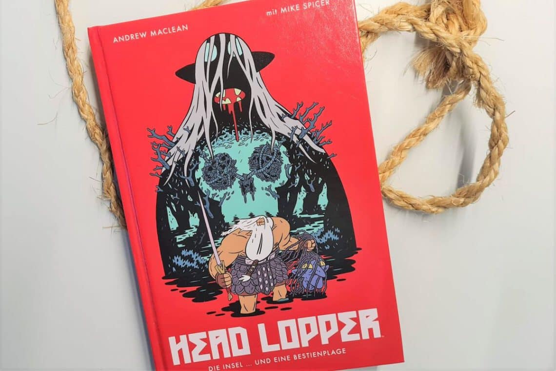 Comic in rot liegt auf einem weißen Hintergrund, daneben ein grobes Seil. Auf dem Cover ein großes Wesen mit Totenkopf auf der Brust und davor ein Krieger mit Schwert und Kopf in den Händen