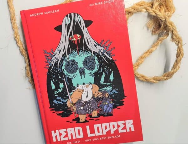 Comic in rot liegt auf einem weißen Hintergrund, daneben ein grobes Seil. Auf dem Cover ein großes Wesen mit Totenkopf auf der Brust und davor ein Krieger mit Schwert und Kopf in den Händen